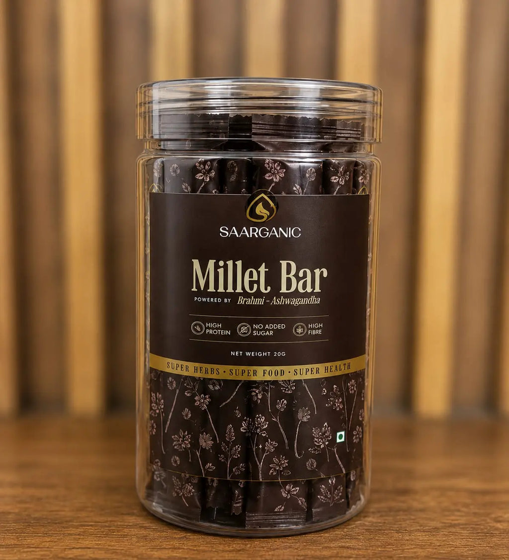 Jar of Saorganic Millet Bars on a wooden surface with a blurred background, Saarganic Millet Bar
Healthy Millet Protein Bar
Ragi and Amaranth Energy Bar
Dates and Whey Protein Bar
Ayurvedic Millet Snack
Natural Energy Nutrition Bar
Healthy Snack Bar India
High Protein Millet Bar
Sugar Free Millet Bar
Superfood Millet Nutrition Bar
